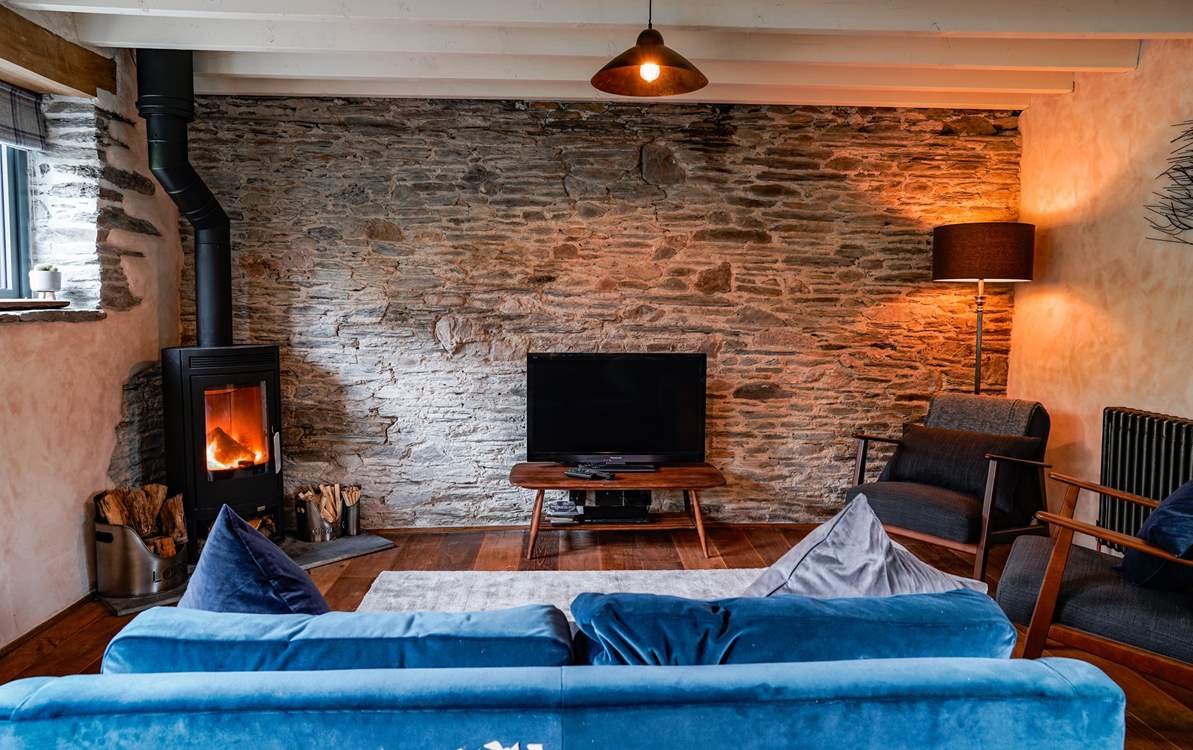 The living-room is part of the open plan living space on the ground floor and it will not fail to impress on first sight.