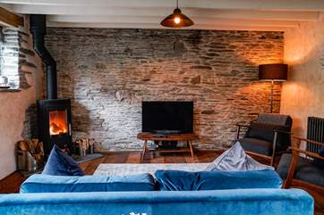 The living-room is part of the open plan living space on the ground floor and it will not fail to impress on first sight.