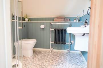 The shower-room is situated between the two bedrooms, with a heated towel rail and waterfall shower there will be no cold mornings.