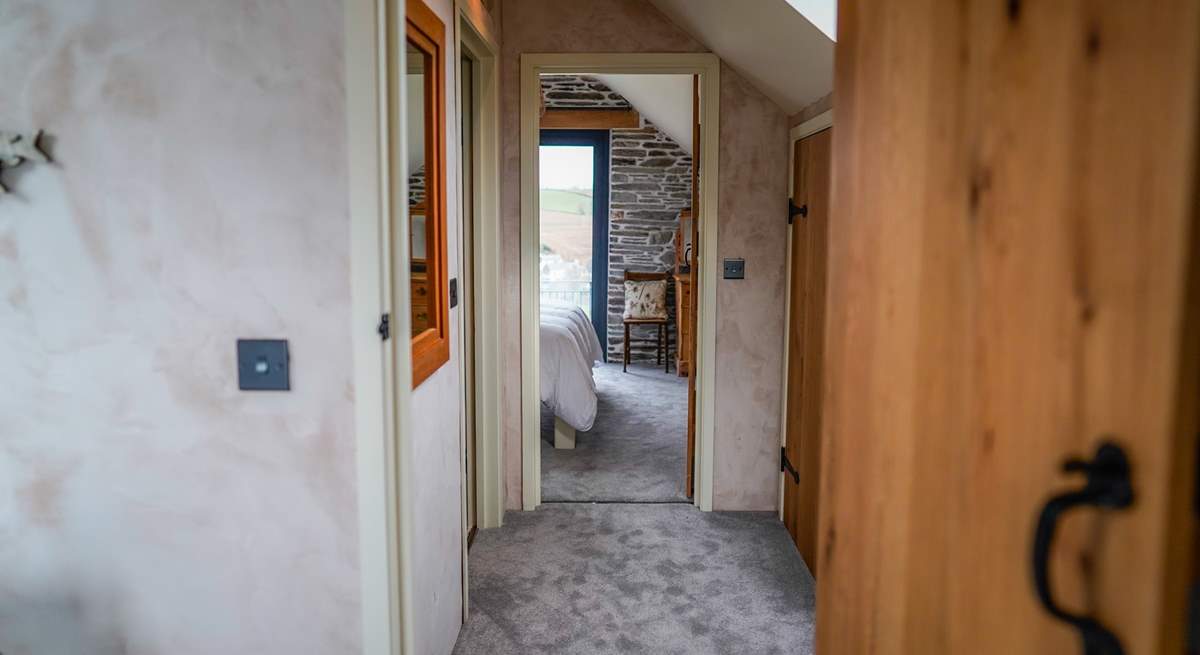 The landing which links the two bedrooms, separated by the shower-room. 