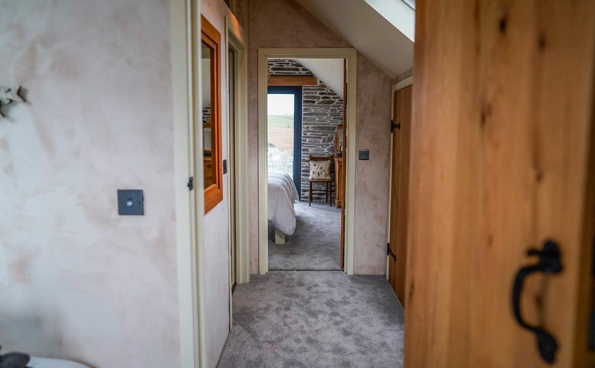 The landing which links the two bedrooms, separated by the shower-room.