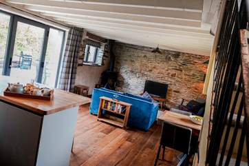 The open plan living area from the foot of the stairs.