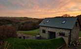 A sunrise view from the field above the barn, the grass bank at over six foot tall gives you total privacy from the owners.  In no way is your privacy compromised. - Thumbnail Image