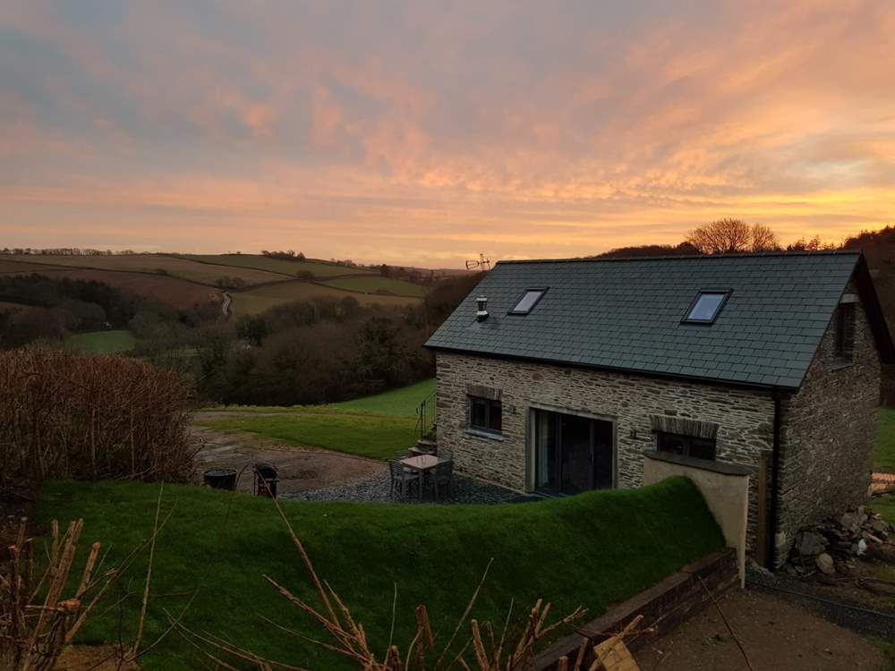 A sunrise view from the field above the barn, the grass bank at over six foot tall gives you total privacy from the owners.  In no way is your privacy compromised.
