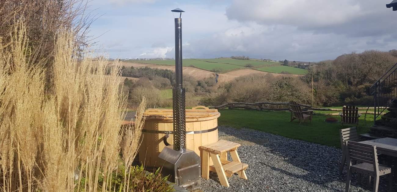 Enjoy the wonderful wood fired hot tub whilst soaking in the view across the valley!