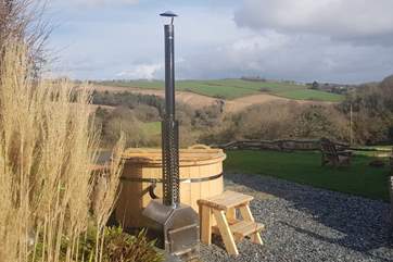 Enjoy the wonderful wood fired hot tub whilst soaking in the view across the valley!