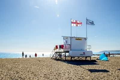 There are lifeguards on the beach  at Seaton during the peak months.