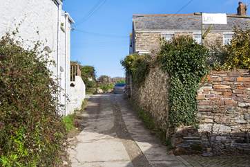 This is the lane leading to Langurra, as you can see it is very narrow. The two standard UK parking spaces are located at the top of the lane. However there are car parks and street parking nearby.