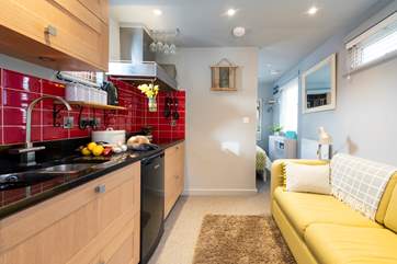 The open plan living area is a perfect space for a light breakfast or supper.