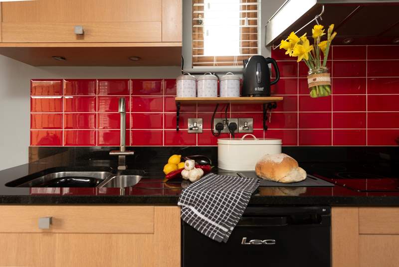 The kitchen has a single ring hob, perfect for light suppers. 