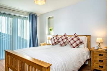 The bedroom has a king-size bed.