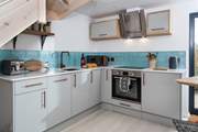 Cook a meal in the well-equipped kitchen.