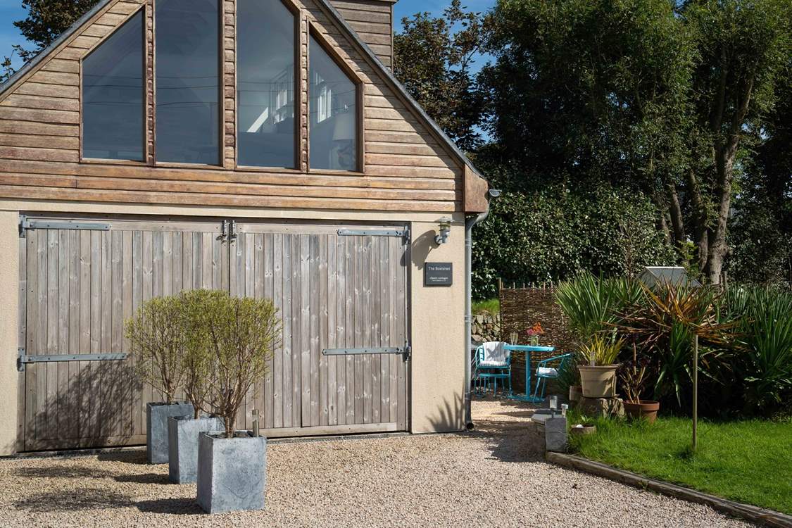 The Boatshed, a detached, reverse level dwelling, set close to Prussia Cove and the South West Coast Path (the