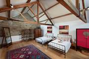 This bedroom offers two double beds but for two guests, lots of room to stretch out (Bedroom 2).