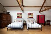 This bedroom is accessed through the games-room and has an en suite bathroom too.