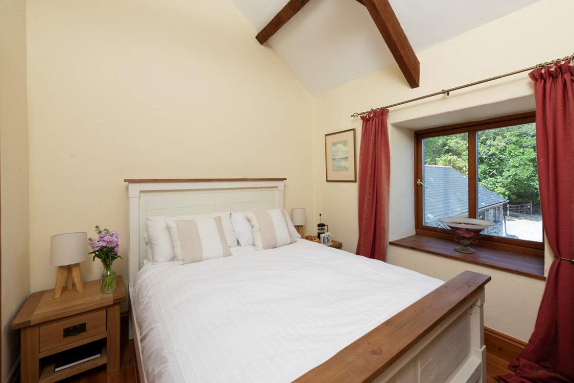 This charming bedroom overlooks the courtyard and is very cosy (Bedroom 6).