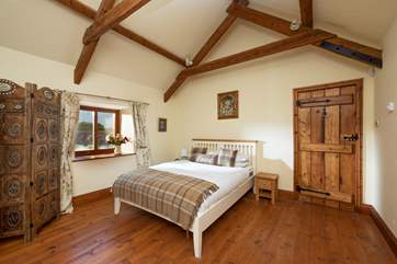 Tucked away at the end of the house, this bedroom has doors that open up to a pretty terrace (Bedroom 7).
