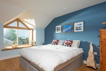 This bedroom has a 'zip and link' bed (king-size or two three-foot singles) and an en suite shower-room (Bedroom 4).