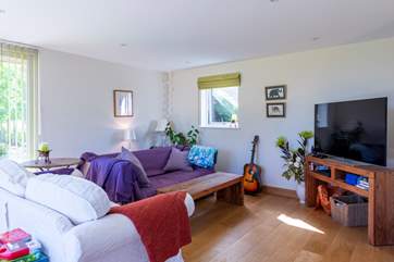 The snug at the end of the kitchen is tucked away and is the perfect spot to sneak away for a moment or two.