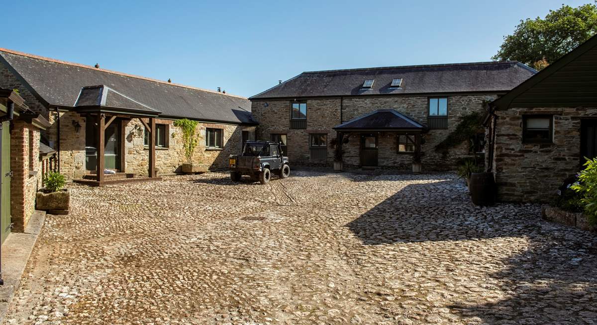 The cobbled courtyard has plenty of space for everyone to park.