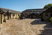 The cobbled courtyard has plenty of space for everyone to park.