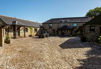 The cobbled courtyard has plenty of space for everyone to park.
