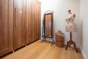 The main bedroom has a dressing-room, perfect for all your holiday clothes.