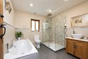 The en suite bathroom for Bedroom 1.