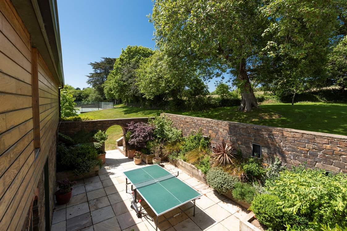 Enjoy a game of table tennis in the courtyard behind the kitchen.