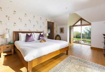 This fabulous bedroom has a dressing room and a huge ensuite bathroom. 