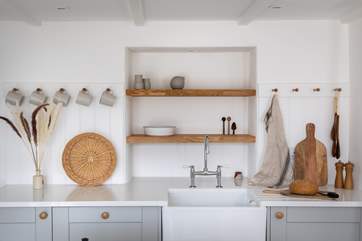 The kitchen is bright and airy.