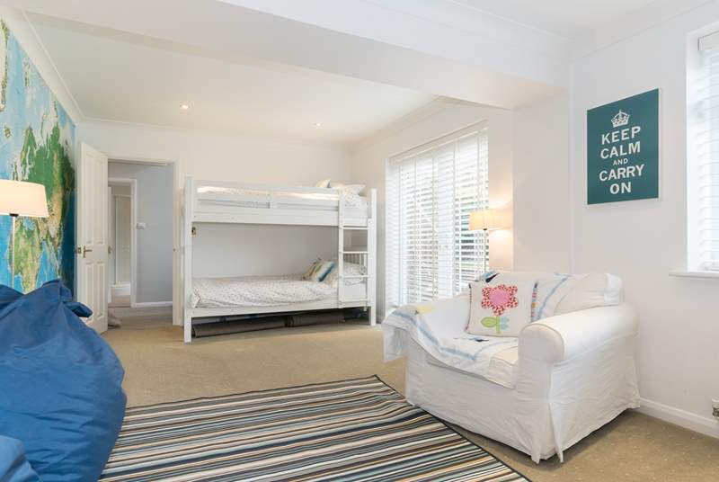The second bedroom on the ground floor with bunk-beds is perfect for the children...