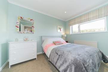 The fourth bedroom with double bed on the first floor.