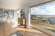 The two b-fold doors on the first floor provide spectacular views across the Solent.