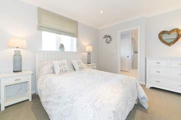 The third bedroom on the first floor with double bed...