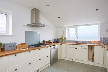 Enjoy cooking in this well-equipped spacious kitchen with sea views.