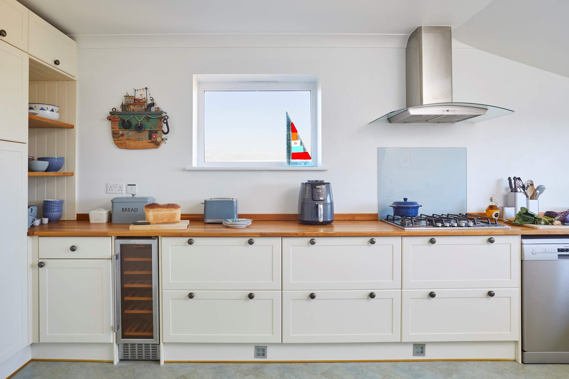 Enjoy cooking in this well-equipped spacious kitchen.