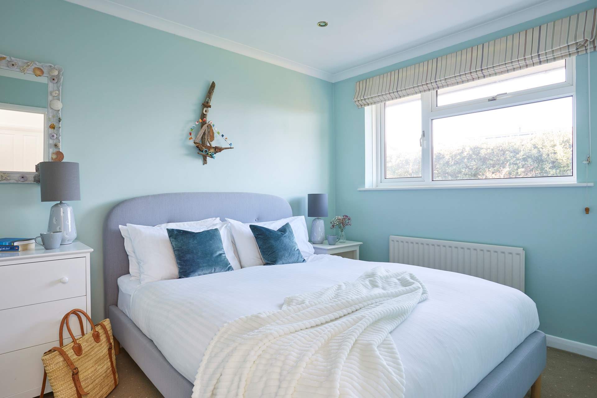 Bedroom 4 is also located on the first floor with king-size bed.