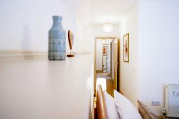The master bedroom is accessed via a corridor passing the WC and bedroom 2.