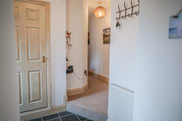 The entrance hall links both sides of the barn together. Please note the step up to bedrooms with another step down to the reception rooms.