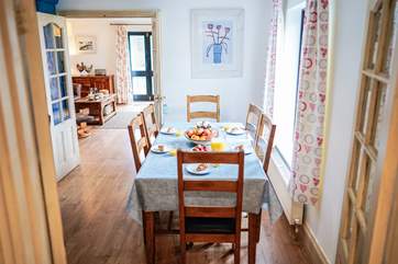 The kitchen/diner is off of the hallway which links through to the sitting-room.