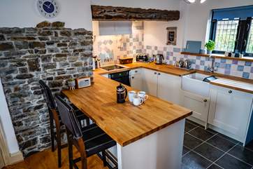 The kitchen/diner is a wonderful room sitting in the middle of the barn.