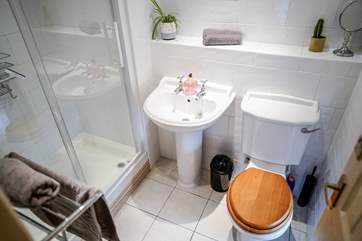 The en suite benefits from a large shower and under-floor heating.