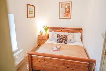 Please note that the bed does sit up against the wall.