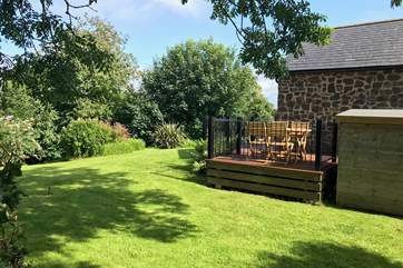 The garden offers hours of fun for all with a wrap around decking area for alfresco dining.