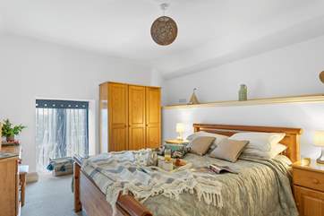 The master en suite bedroom is a spacious room at the opposite end of the barn to the sitting-room. This is bedroom one.