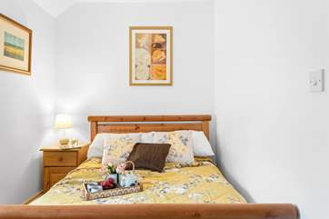 Bedroom two, also on the ground floor, has a double bed.