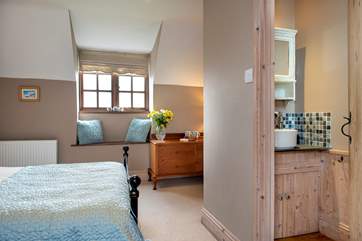 This bedroom overlooks both the garden and the front of the cottage and has an en suite WC.