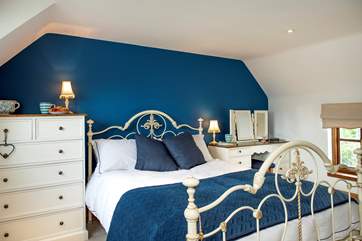 This bedroom has a king-size bed, stretch out and relax (Bedroom 2).