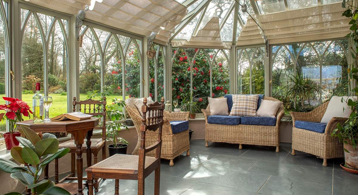 Enjoy tranquil views over the garden. 